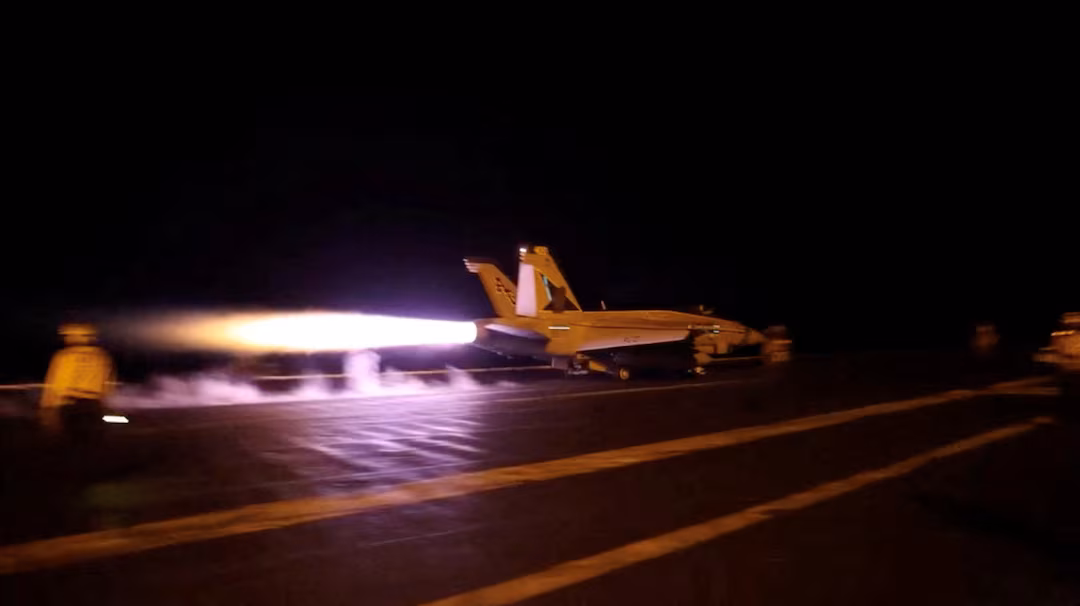 A U.S. military aircraft takes off from an unknown location during what U.S. Central Command (CENTCOM) says are strikes on Iran
