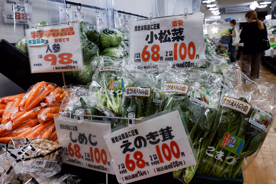 Price tags of items are displayed at a vegetable shop in Tokyo