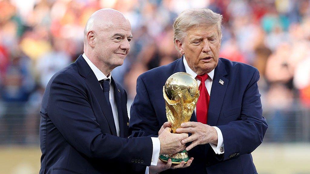 Fifa president Gianni Infantino (left) and US president Donald Trump with the World Cup trophy