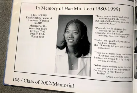 Getty Images A school yearbook with a black and white photo of a smiling schoolgirl under the heading 'In Memory of Hae Min Lee (1980-1999)'. On the left is a list of clubs she attended and on the right is a poem. At the foot of the page it says 'Class of 2002/Memorial'