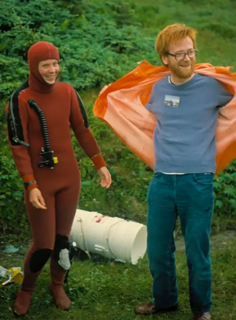 Prof. Curt Pueschel Christine Maggs in 1982 in a home-made drysuit with her PhD supervisor Mike Guiry beside her.