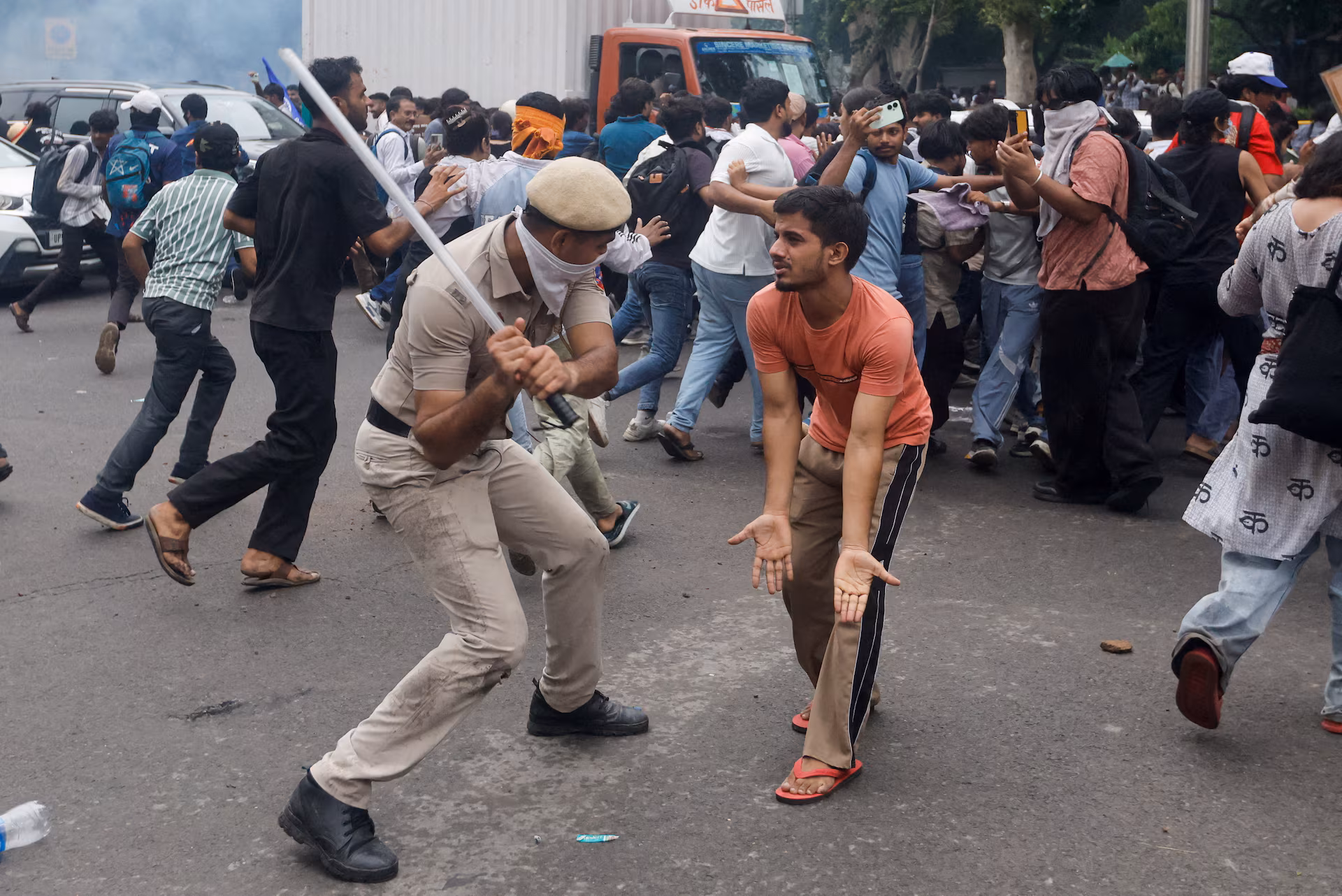 FILE PHOTO: India's Cockroach party supporters march on parliament in New Delhi