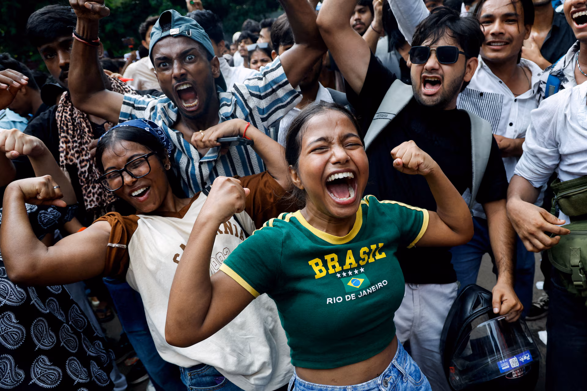 FILE PHOTO: Supporters of India's Cockroach Janta Party (CJP) celebrate after India's Education Minister Dharmendra Pradhan resigned, in New Delhi