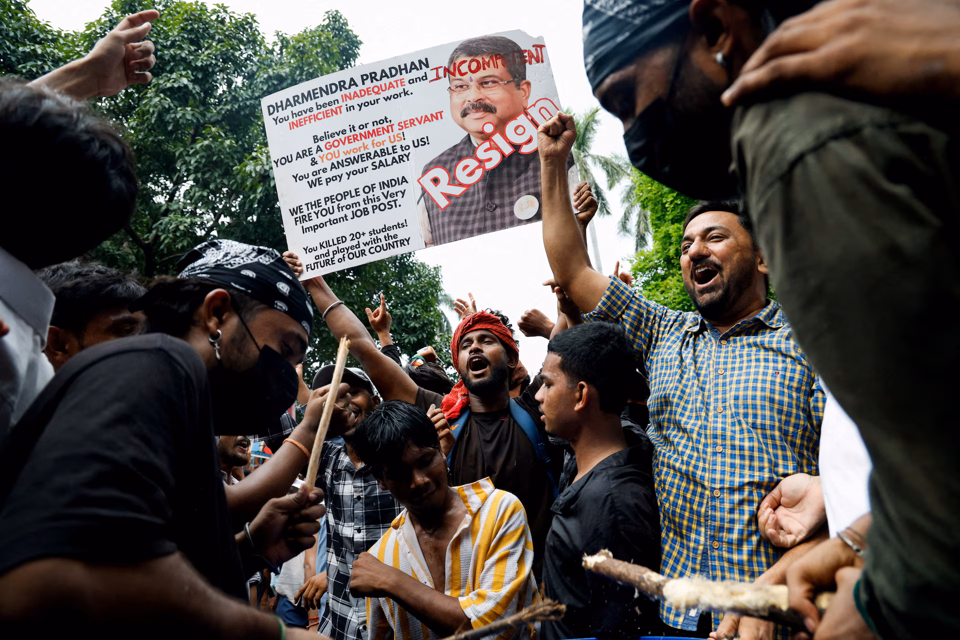 FILE PHOTO: Supporters of India's Cockroach Janta Party (CJP) celebrate after India's Education Minister Dharmendra Pradhan resigned, in New Delhi
