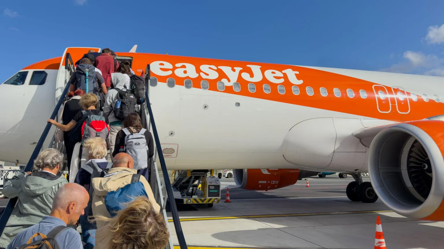 Getty Images People boarding an EasyJet plane