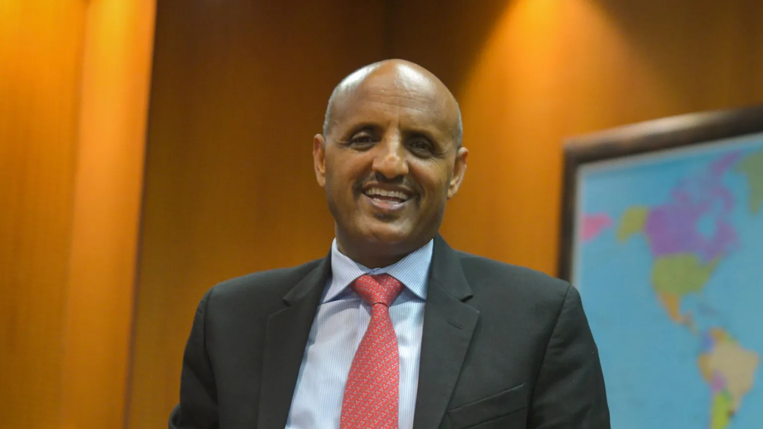 AFP via Getty Images Tewolde Gebremariam, the new CEO for Air India, standing in a boardroom